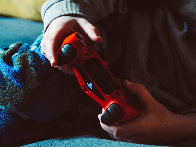 Close-up of a controller and neon HUD